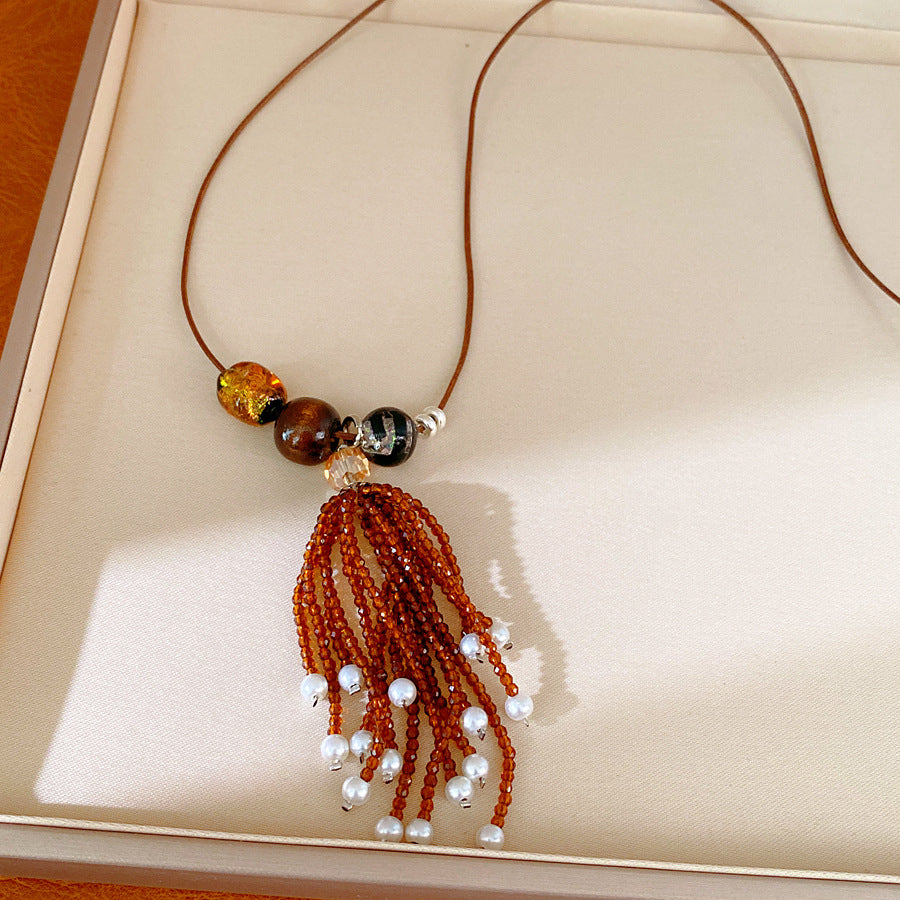 Leather rope beaded fringed pearl necklace casual temperament fashion versatile sweater chain high sense light luxury necklace wholesale