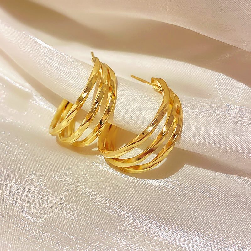 Silver needle metal earrings, high-end simple stud earrings, fashionable versatile light luxury personalized niche earrings, Yiwu wholesale