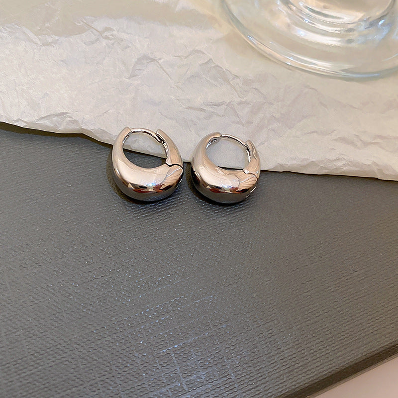 Silver needle metal earrings, high-end simple stud earrings, fashionable versatile light luxury personalized niche earrings, Yiwu wholesale