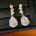 Wholesale boutique jewelry, bulk fashion jewelry suppliers, dropship pearl earrings.