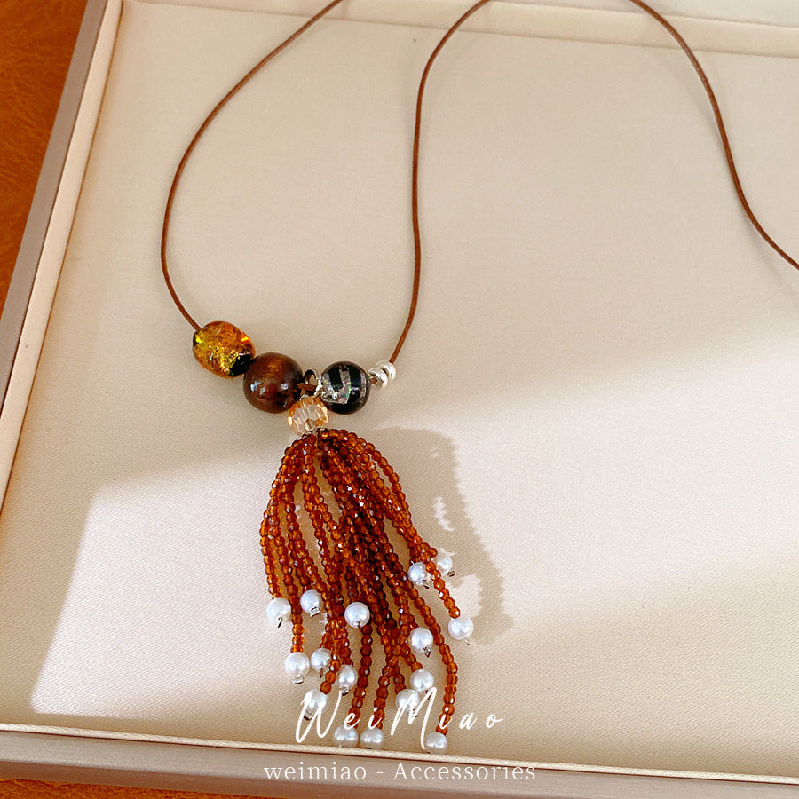 Leather rope beaded fringed pearl necklace casual temperament fashion versatile sweater chain high sense light luxury necklace wholesale