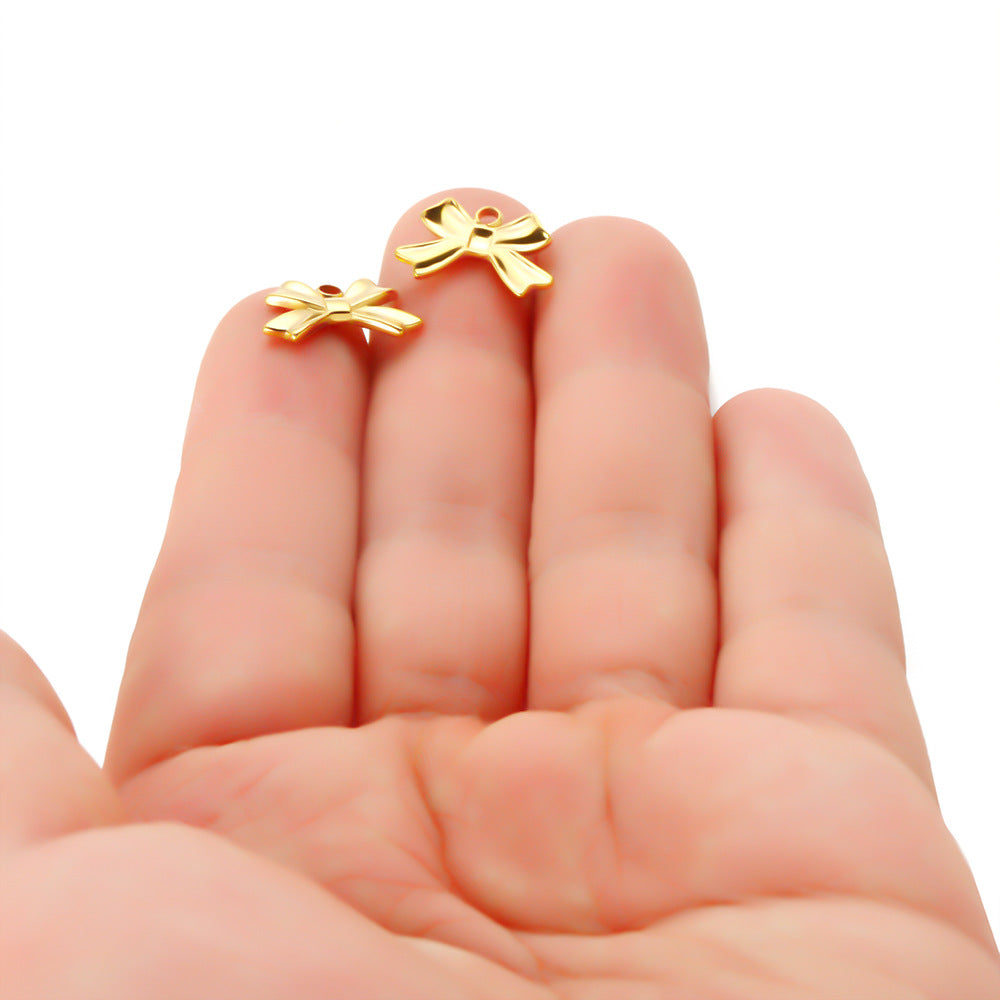 Stainless steel gold bow small pendant DIY jewelry accessories pendant bracelet necklace pendant pendant wholesale