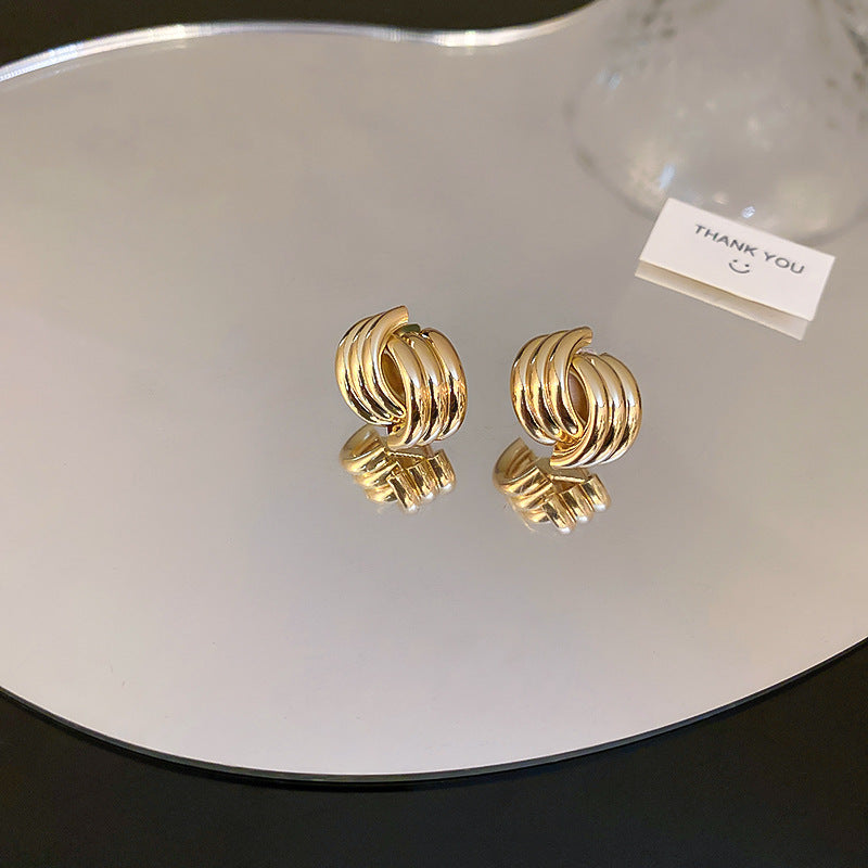 Silver needle metal earrings, high-end simple stud earrings, fashionable versatile light luxury personalized niche earrings, Yiwu wholesale