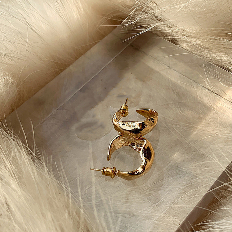 Silver needle metal earrings, high-end simple stud earrings, fashionable versatile light luxury personalized niche earrings, Yiwu wholesale