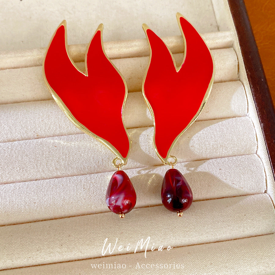 Silver needle dripping oil water drop stud earrings European and American style personality temperament niche exaggerated earrings light luxury high-end earrings women