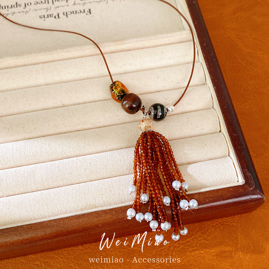 Leather rope beaded fringed pearl necklace casual temperament fashion versatile sweater chain high sense light luxury necklace wholesale