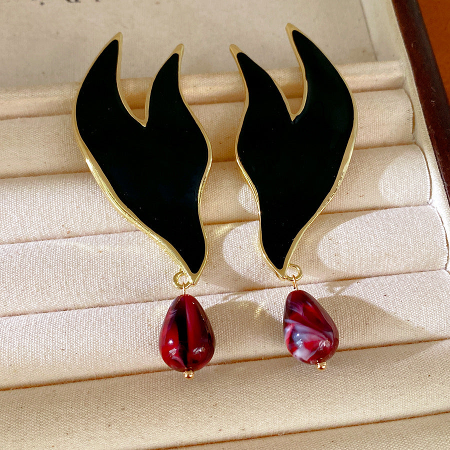Silver needle dripping oil water drop stud earrings European and American style personality temperament niche exaggerated earrings light luxury high-end earrings women