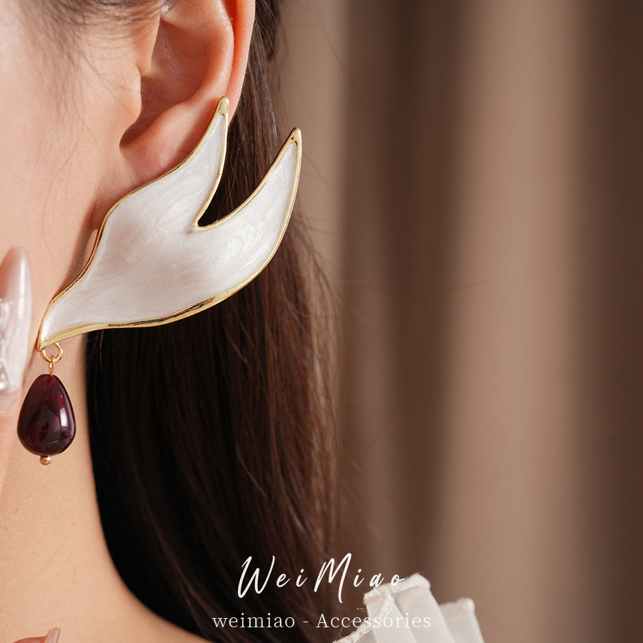 Silver needle dripping oil water drop stud earrings European and American style personality temperament niche exaggerated earrings light luxury high-end earrings women