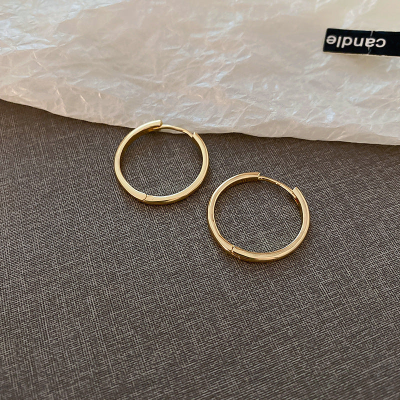 Silver needle metal earrings, high-end simple stud earrings, fashionable versatile light luxury personalized niche earrings, Yiwu wholesale