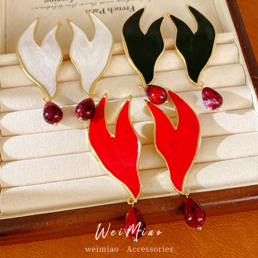 Silver needle dripping oil water drop stud earrings European and American style personality temperament niche exaggerated earrings light luxury high-end earrings women